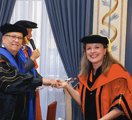 Dr. Cécile Ellert receiving her Ph.D. in Quantum Aromatherapy